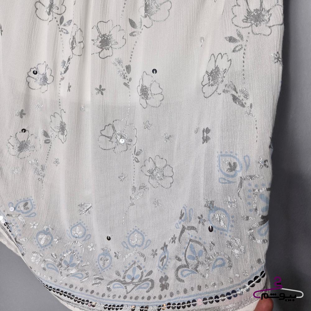 دامن سفید طرحدار پولک دوزی شده